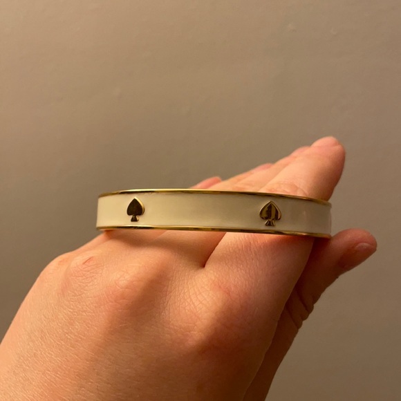 Kate Spade gold and white enamel bangle